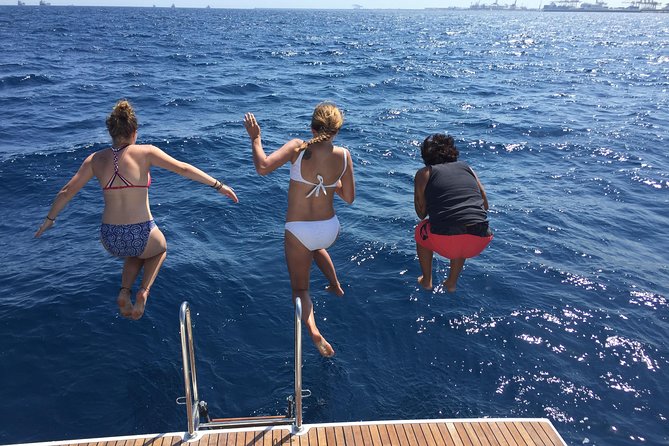 Wonderful 2 Hour Sailing trip including open bar and Pinchos - Passing Barceloneta’s beaches from offshore
